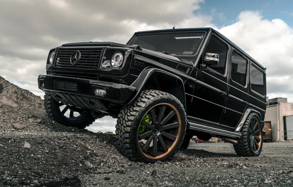 Детский электромобиль джип Mercedes G63 AMG черный лак гелик